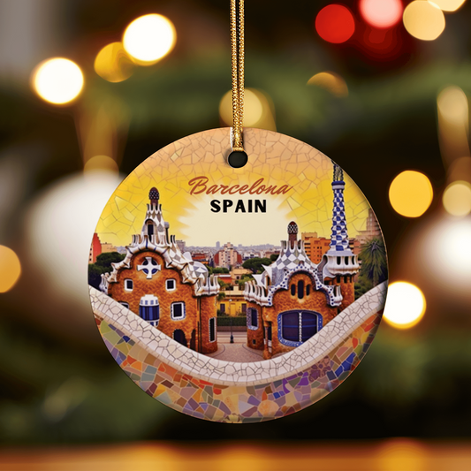 This vibrant ornament features an image of the casa batllo' building in Barcelona, Spain with a sunset background.