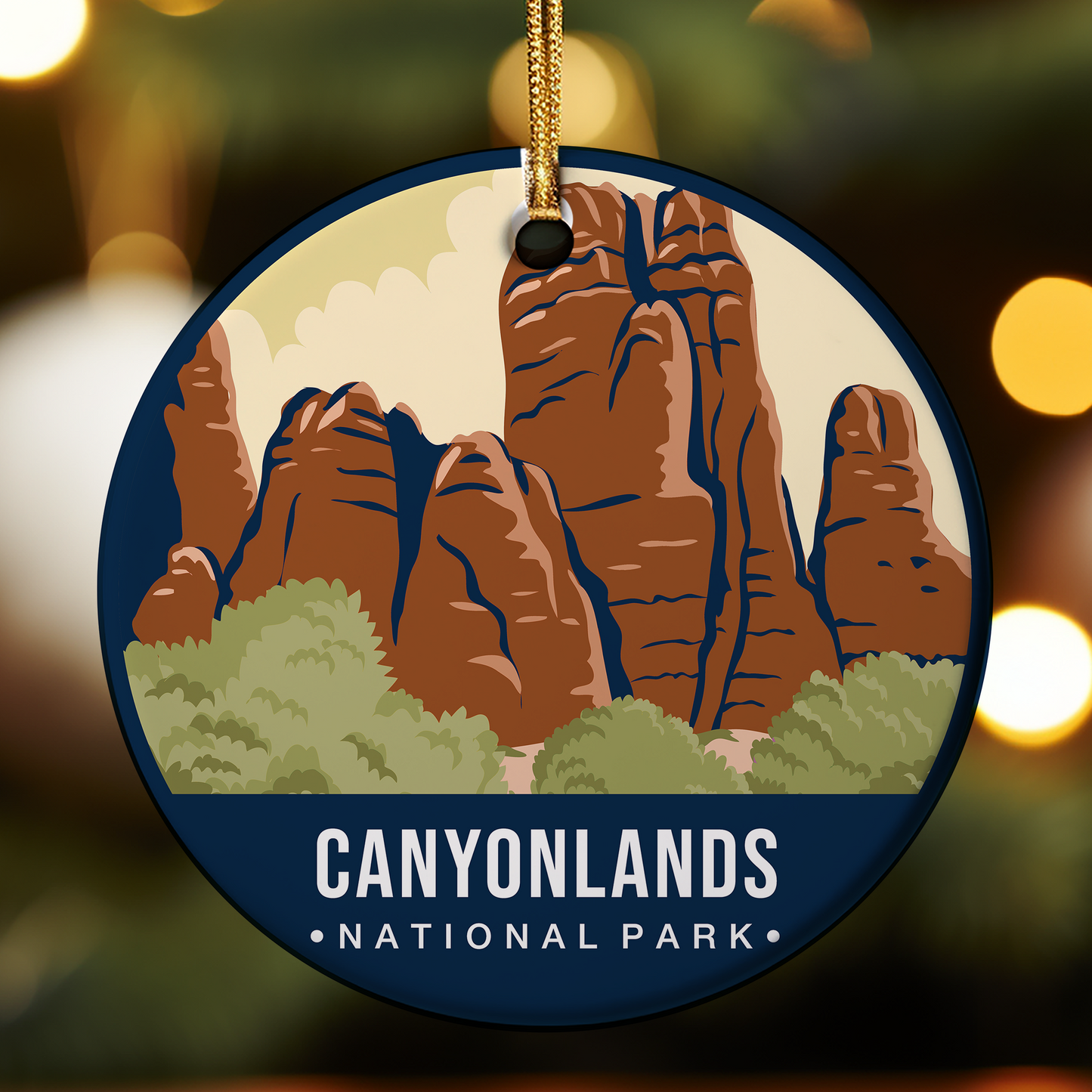 Round ornament with Canyonlands National Park design on a blurred lights background
