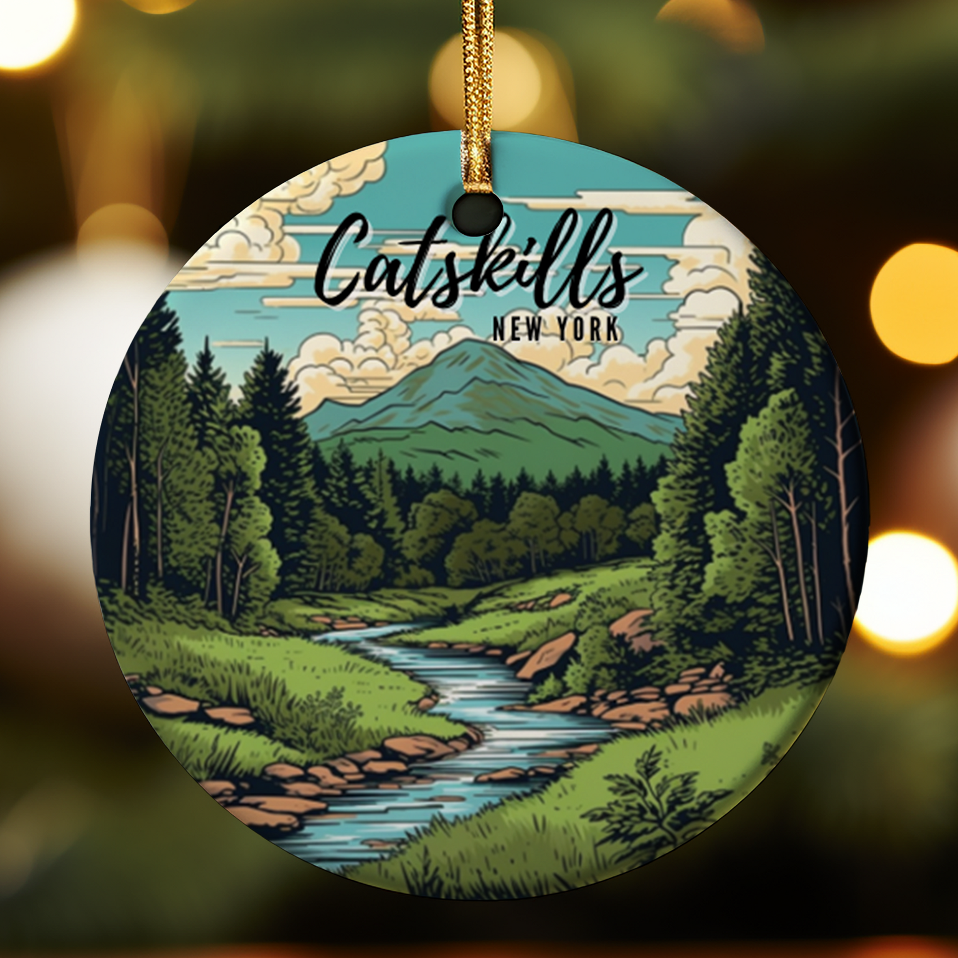 Circular ornament with Catskills New York design featuring a mountain, trees, and stream.