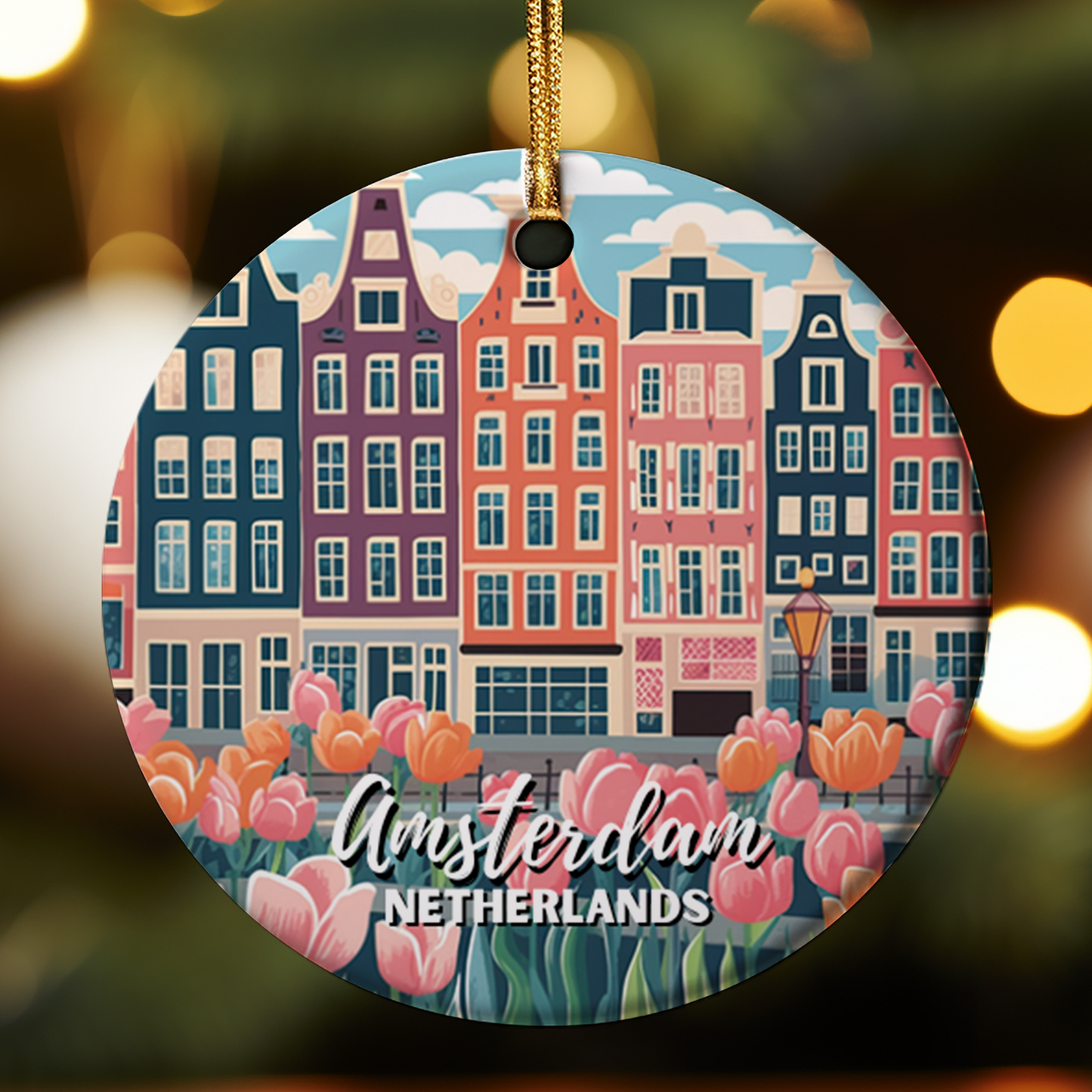 Circular ornament with colorful depiction of Amsterdam buildings and tulips, featuring the text 'Amsterdam Netherlands'.