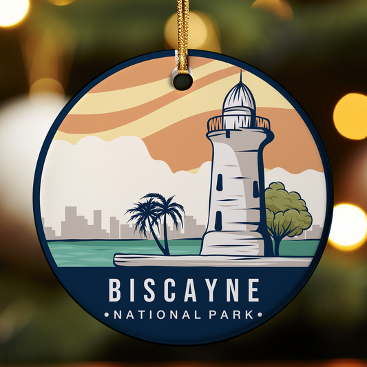 Decorative ornament with a lighthouse design and 'Biscayne National Park' text on a blurred background.
