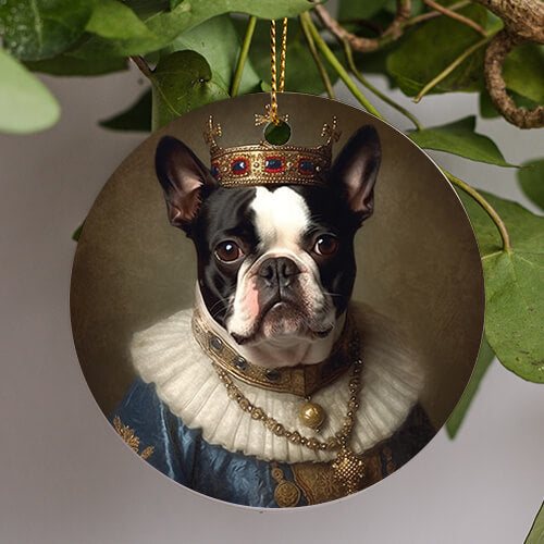 This Everyday Ornament is of a photo realistic Boston Terrier King with brown eyes. A golden crown adorned with dark sapphire gemstones sits on his head. A golden collar with gems and golden chain hang from his neck above the ruff. A rich cerulean blue material with golden ornate patterns are stitched into the royal gown.