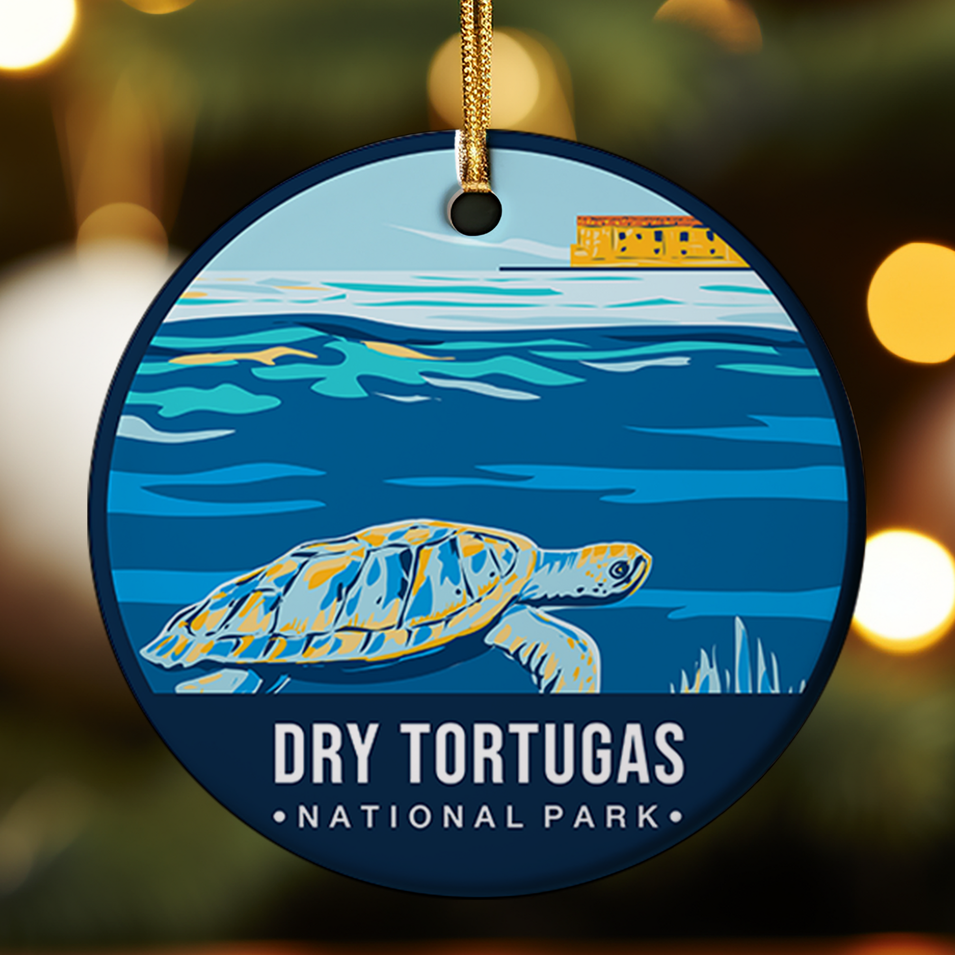 Decorative ornament with a turtle and 'Dry Tortugas National Park' text on a blurred lights background