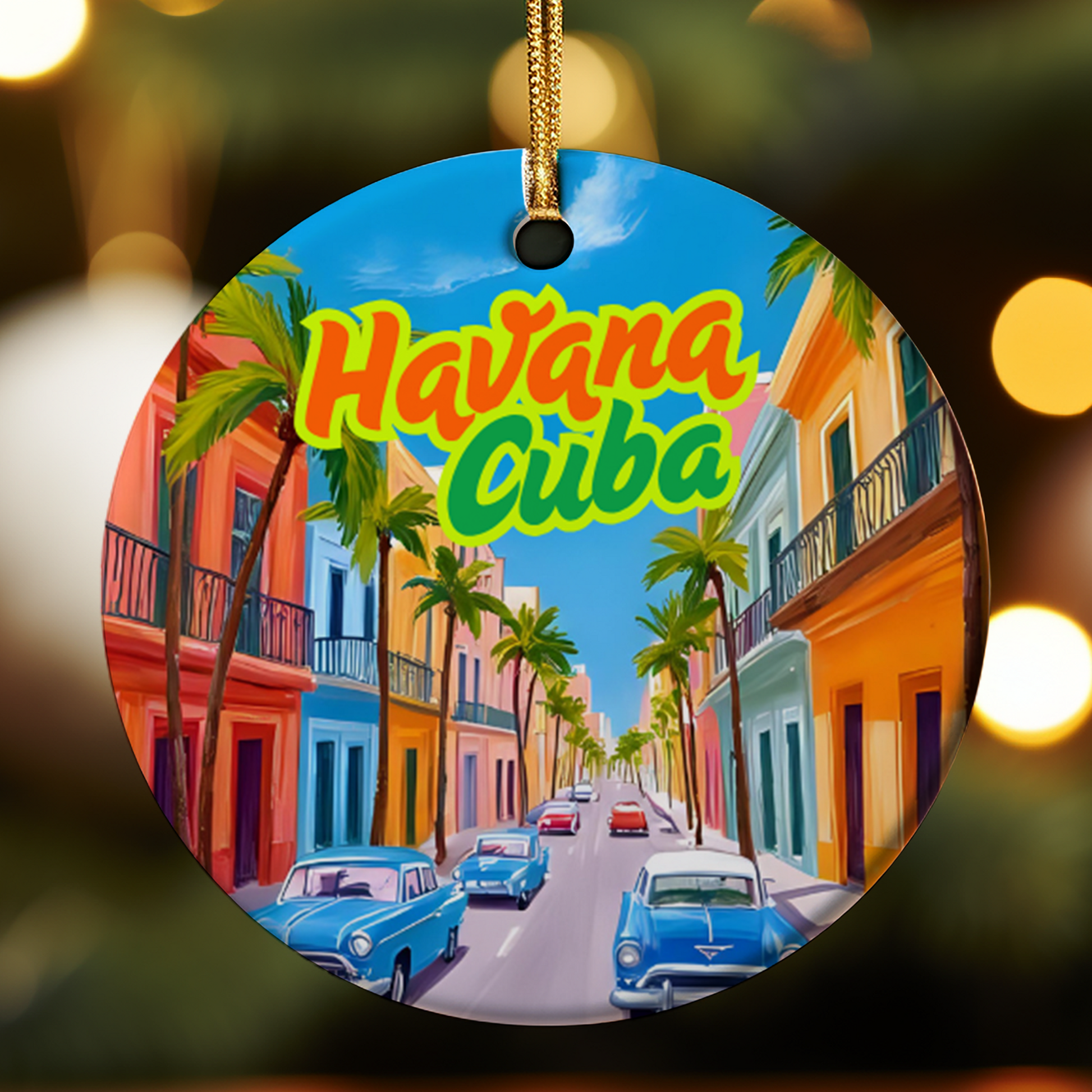 Circular ornament with a colorful street scene of Havana, Cuba, featuring palm trees and vintage cars.