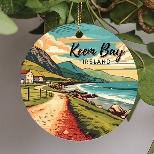 This holiday ornament displays an illustration of beautiful Keem Bay Ireland’s sheltered beach and cliffs near an unpaved rocky road. Warm soft pastel color pallet compliments the composition as the waves softly crash a shore.