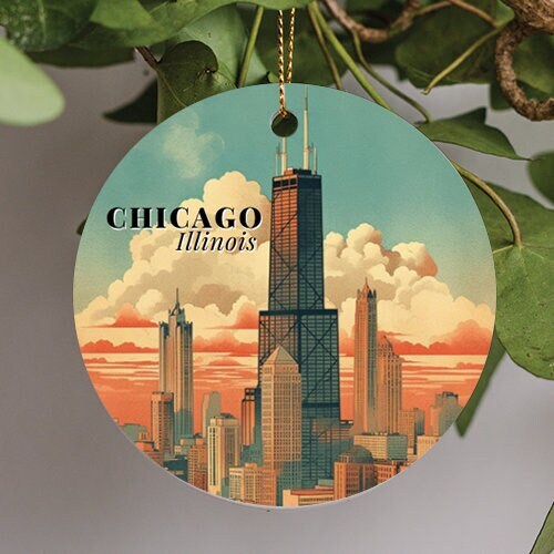 This retro illustrated ornament features the Willis Tower in Chicago, Illinois, with a blue sky and puffy clouds in the background.