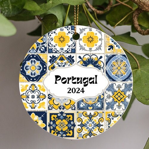 Traditional ornate portuguese decorative tiles azulejos. Vintage pattern in blue and yellow theme. Abstract background with custom year and portugal on the front.