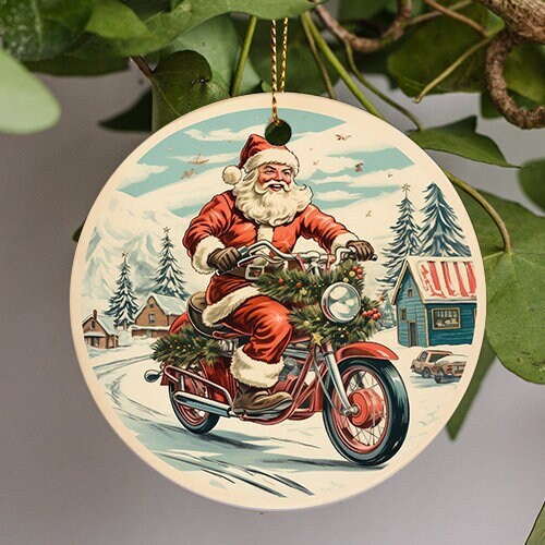 This holiday ornament displays a cheerful Santa riding a motorcycle equipped with wreath wrapped around the head light. A clod snow covered morning gives him the sense of urgency as Santa drives past the peppermint roof decorated waffel house.