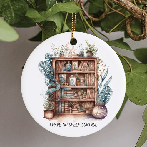 This Everyday Ornament is in a water color style. It features an old wooden book shelf holding various books standing up and lying down scattered around the four shelves. Some bottles and vases are also visible in the shelves while pots filled with large Monstera Deliciosa house plants sit in front.